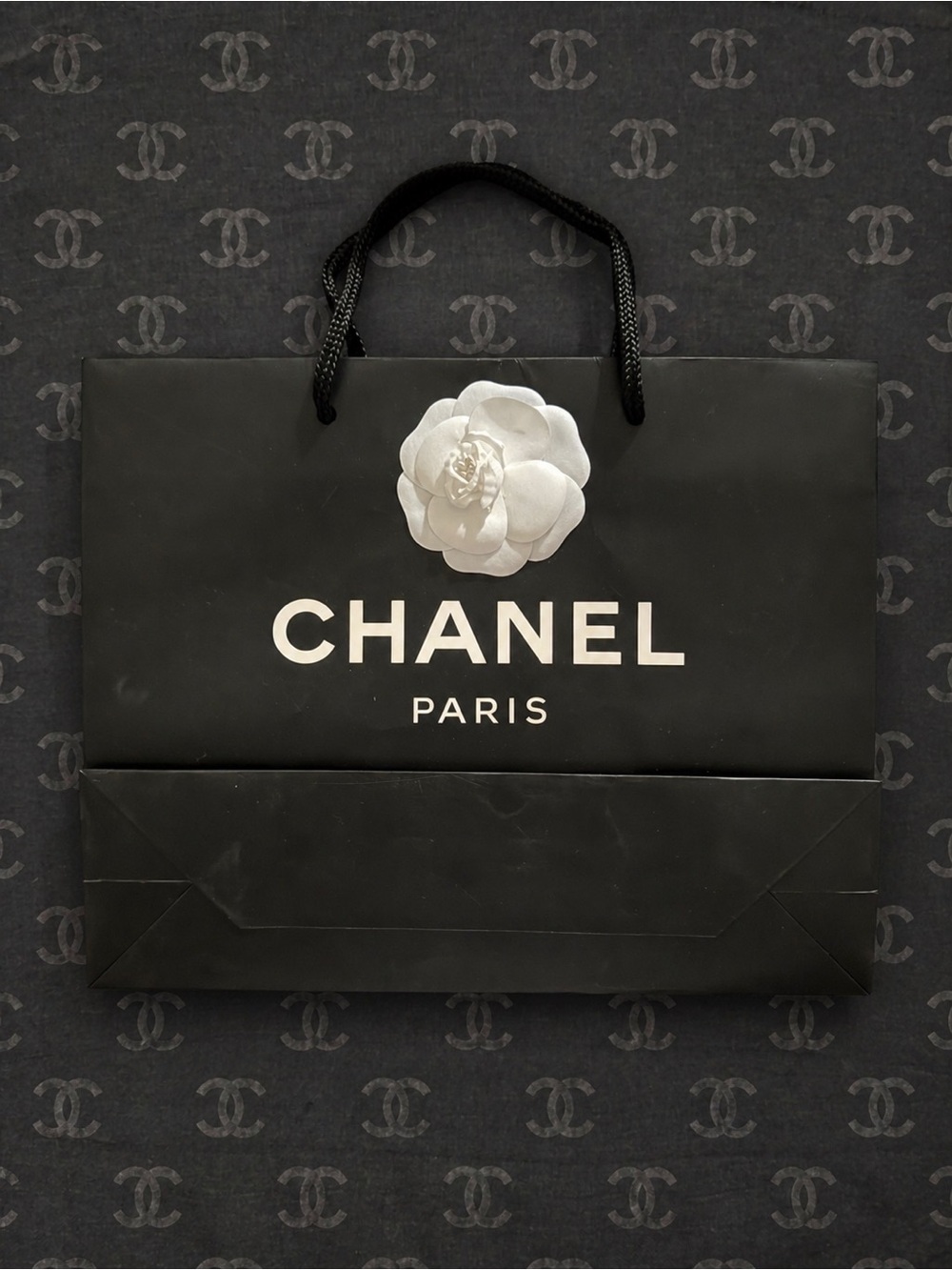 CHANEL Black Shopping Bag with White Camellia